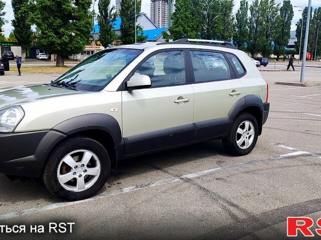Серый Хендай Туксон, объемом двигателя 2 л и пробегом 249 тыс. км за 7300 $, фото 4 на Automoto.ua
