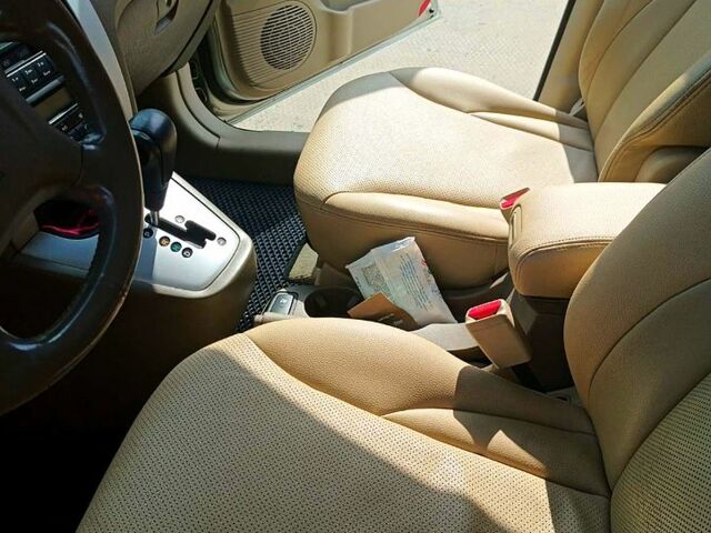 Сірий Хендай Туксон, об'ємом двигуна 2 л та пробігом 178 тис. км за 8500 $, фото 2 на Automoto.ua