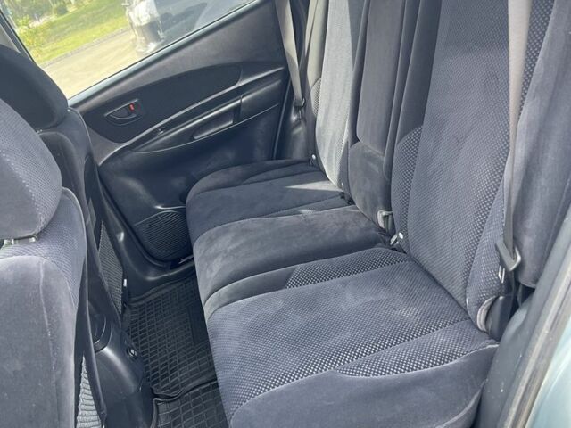 Сірий Хендай Туксон, об'ємом двигуна 2 л та пробігом 170 тис. км за 8700 $, фото 13 на Automoto.ua