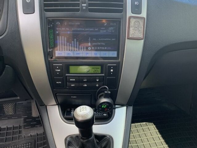 Серый Хендай Туксон, объемом двигателя 2 л и пробегом 228 тыс. км за 7400 $, фото 13 на Automoto.ua