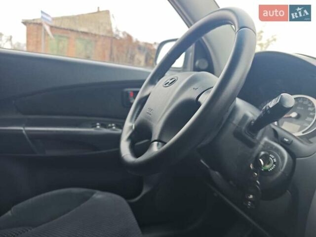 Серый Хендай Туксон, объемом двигателя 1.98 л и пробегом 173 тыс. км за 7450 $, фото 12 на Automoto.ua