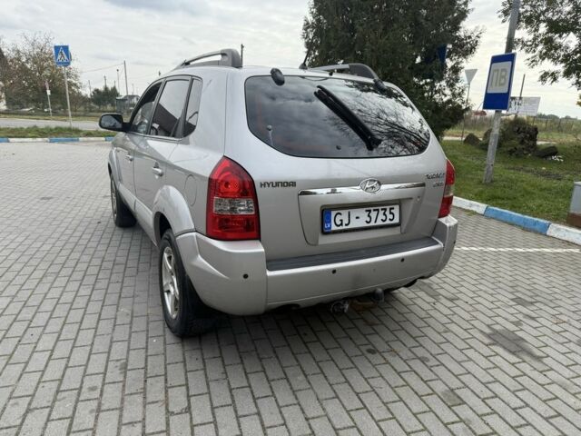 Серый Хендай Туксон, объемом двигателя 2 л и пробегом 175 тыс. км за 3400 $, фото 4 на Automoto.ua