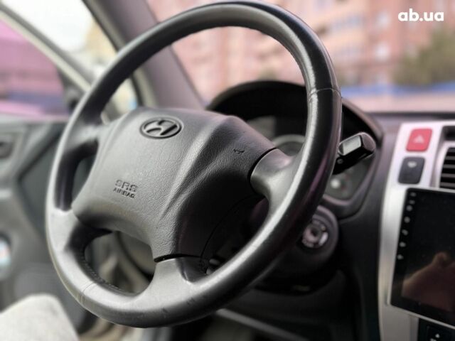 Серый Хендай Туксон, объемом двигателя 2 л и пробегом 214 тыс. км за 7990 $, фото 28 на Automoto.ua