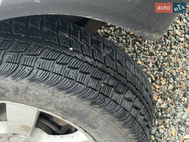 Сірий Хендай Туксон, об'ємом двигуна 1.98 л та пробігом 169 тис. км за 7890 $, фото 6 на Automoto.ua