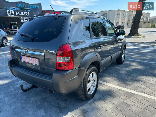 Сірий Хендай Туксон, об'ємом двигуна 1.98 л та пробігом 169 тис. км за 7300 $, фото 9 на Automoto.ua
