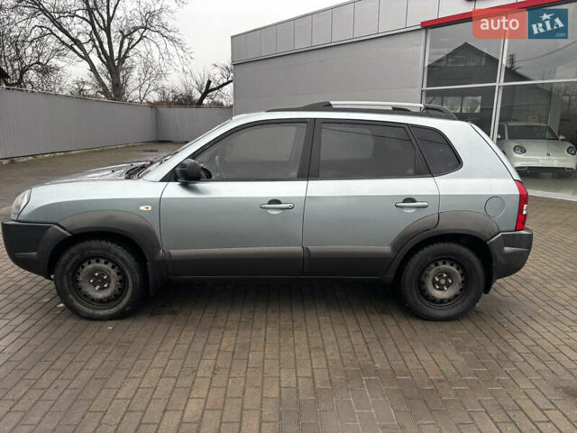 Сірий Хендай Туксон, об'ємом двигуна 2 л та пробігом 255 тис. км за 7600 $, фото 5 на Automoto.ua