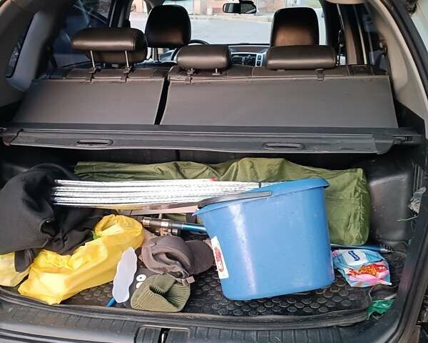 Сірий Хендай Туксон, об'ємом двигуна 1.98 л та пробігом 160 тис. км за 9000 $, фото 8 на Automoto.ua