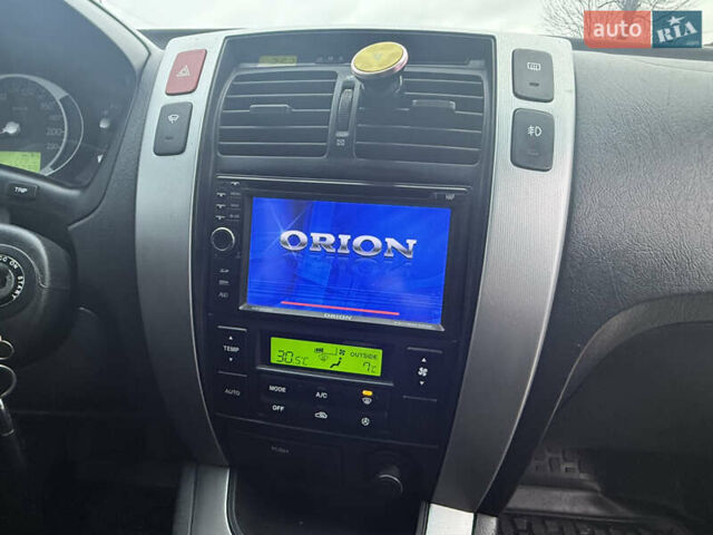 Сірий Хендай Туксон, об'ємом двигуна 1.98 л та пробігом 169 тис. км за 7890 $, фото 8 на Automoto.ua