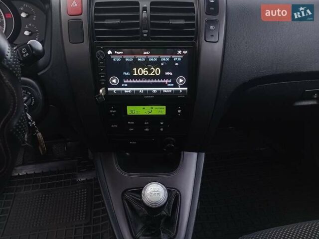 Сірий Хендай Туксон, об'ємом двигуна 1.98 л та пробігом 225 тис. км за 6999 $, фото 31 на Automoto.ua