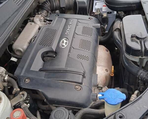 Сірий Хендай Туксон, об'ємом двигуна 1.98 л та пробігом 157 тис. км за 7800 $, фото 36 на Automoto.ua