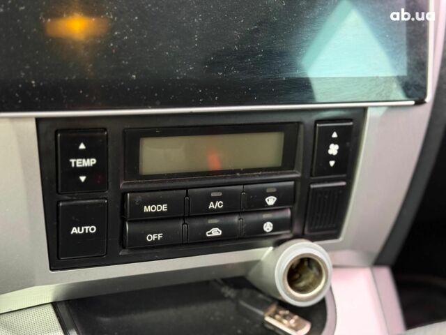 Серый Хендай Туксон, объемом двигателя 2 л и пробегом 214 тыс. км за 7990 $, фото 26 на Automoto.ua