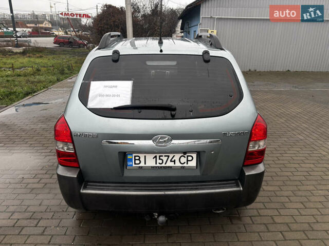 Сірий Хендай Туксон, об'ємом двигуна 2 л та пробігом 255 тис. км за 7600 $, фото 7 на Automoto.ua