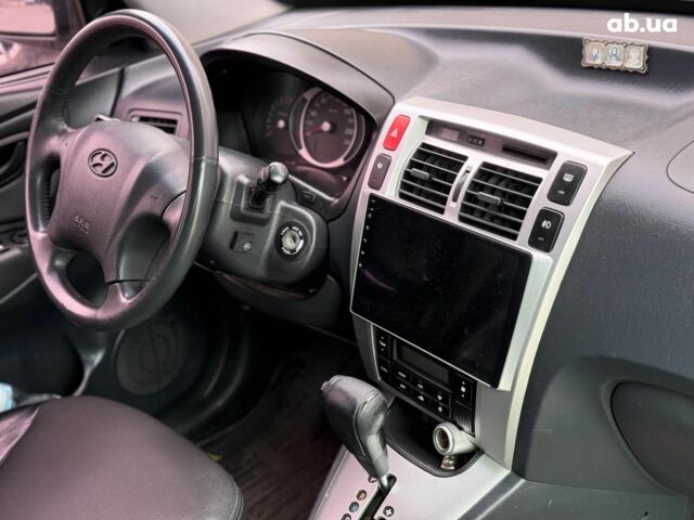 Серый Хендай Туксон, объемом двигателя 2 л и пробегом 214 тыс. км за 7990 $, фото 15 на Automoto.ua