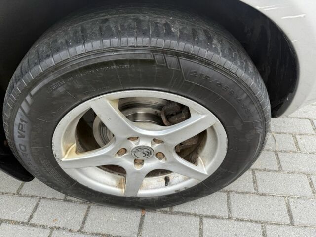 Серый Хендай Туксон, объемом двигателя 2 л и пробегом 175 тыс. км за 3400 $, фото 14 на Automoto.ua