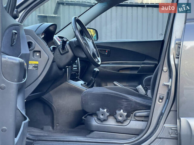 Серый Хендай Туксон, объемом двигателя 2 л и пробегом 182 тыс. км за 7600 $, фото 46 на Automoto.ua