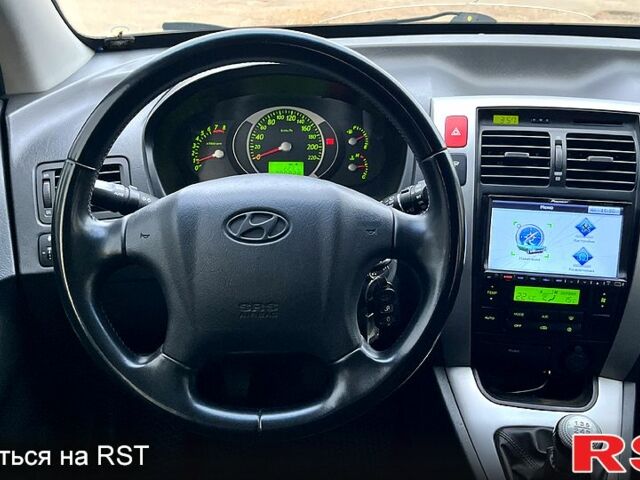 Сірий Хендай Туксон, об'ємом двигуна 2 л та пробігом 281 тис. км за 7200 $, фото 12 на Automoto.ua