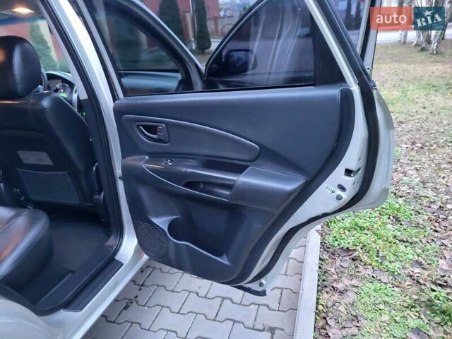 Серый Хендай Туксон, объемом двигателя 2 л и пробегом 240 тыс. км за 8300 $, фото 120 на Automoto.ua