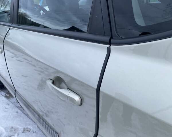 Серый Хендай Туксон, объемом двигателя 2 л и пробегом 213 тыс. км за 7999 $, фото 3 на Automoto.ua