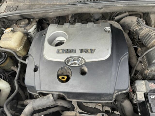 Серый Хендай Туксон, объемом двигателя 2 л и пробегом 175 тыс. км за 3400 $, фото 8 на Automoto.ua