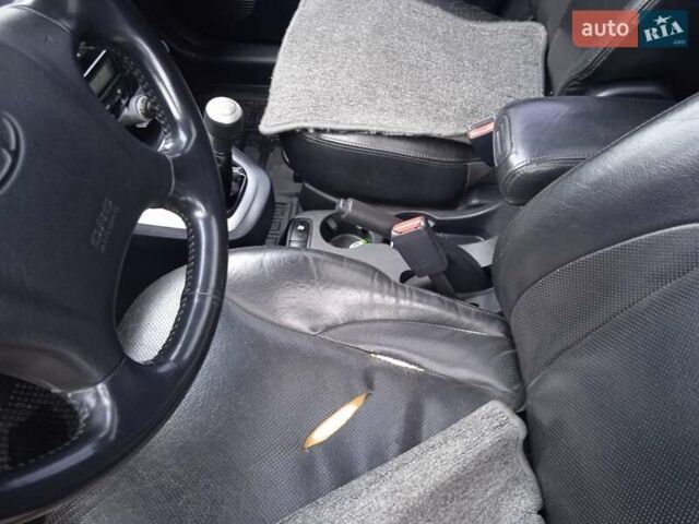 Сірий Хендай Туксон, об'ємом двигуна 1.98 л та пробігом 157 тис. км за 7800 $, фото 44 на Automoto.ua