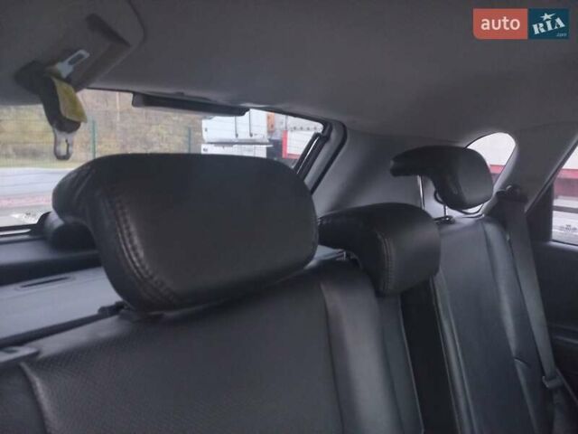 Сірий Хендай Туксон, об'ємом двигуна 2 л та пробігом 190 тис. км за 8600 $, фото 46 на Automoto.ua