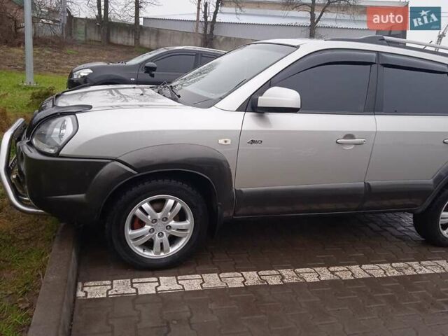 Сірий Хендай Туксон, об'ємом двигуна 1.98 л та пробігом 157 тис. км за 7800 $, фото 9 на Automoto.ua