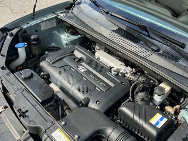 Сірий Хендай Туксон, об'ємом двигуна 2 л та пробігом 170 тис. км за 8700 $, фото 16 на Automoto.ua