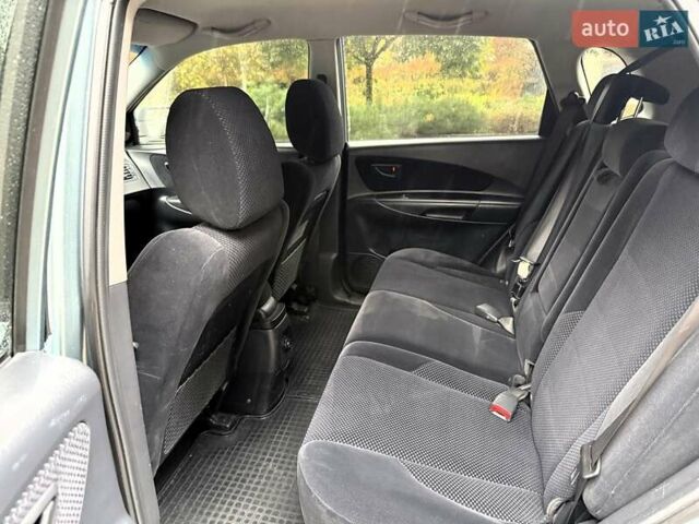 Серый Хендай Туксон, объемом двигателя 1.98 л и пробегом 218 тыс. км за 7900 $, фото 11 на Automoto.ua