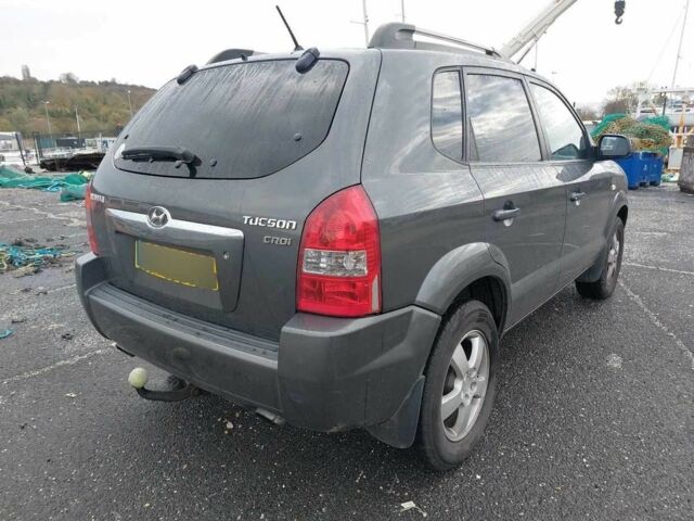 Серый Хендай Туксон, объемом двигателя 2 л и пробегом 245 тыс. км за 4112 $, фото 2 на Automoto.ua