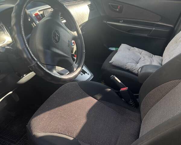 Серый Хендай Туксон, объемом двигателя 2 л и пробегом 161 тыс. км за 7000 $, фото 8 на Automoto.ua