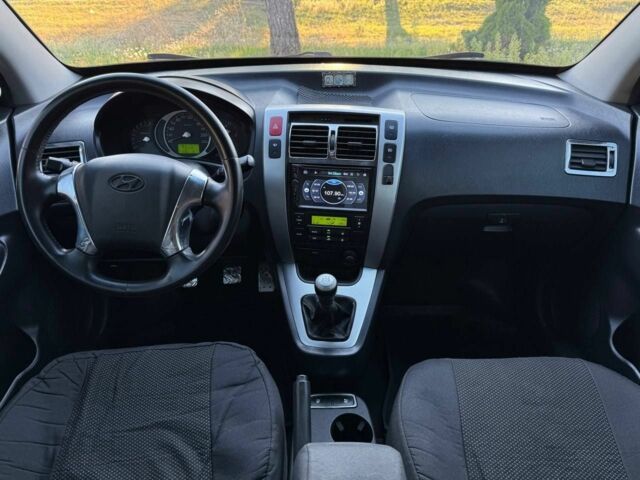 Серый Хендай Туксон, объемом двигателя 2 л и пробегом 282 тыс. км за 7950 $, фото 15 на Automoto.ua