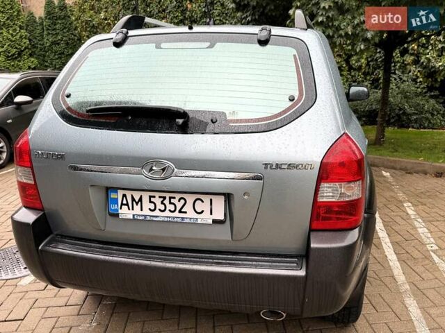 Серый Хендай Туксон, объемом двигателя 1.98 л и пробегом 218 тыс. км за 7900 $, фото 8 на Automoto.ua