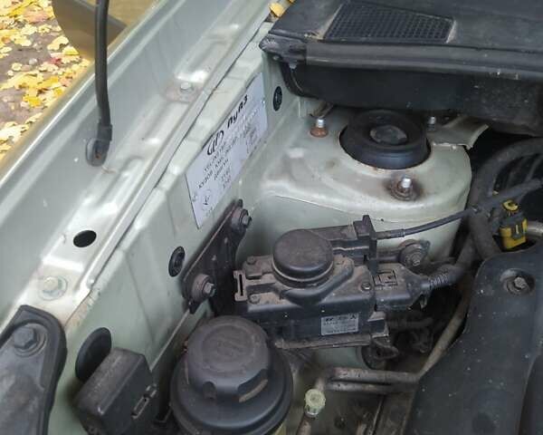 Серый Хендай Туксон, объемом двигателя 1.98 л и пробегом 250 тыс. км за 7300 $, фото 16 на Automoto.ua