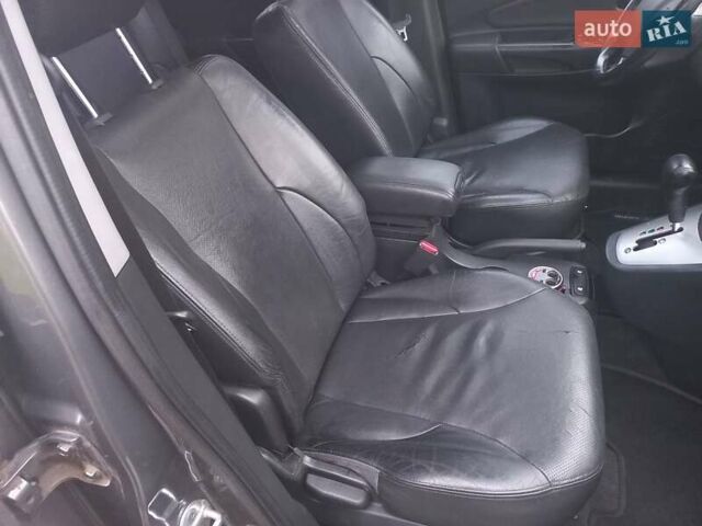 Сірий Хендай Туксон, об'ємом двигуна 2 л та пробігом 190 тис. км за 8600 $, фото 43 на Automoto.ua