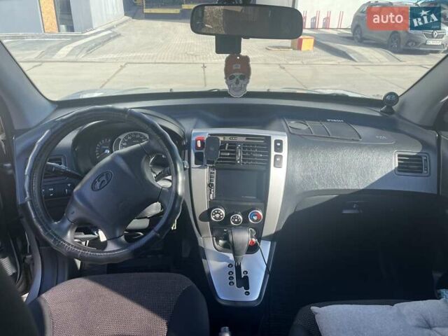 Серый Хендай Туксон, объемом двигателя 2 л и пробегом 161 тыс. км за 7000 $, фото 6 на Automoto.ua