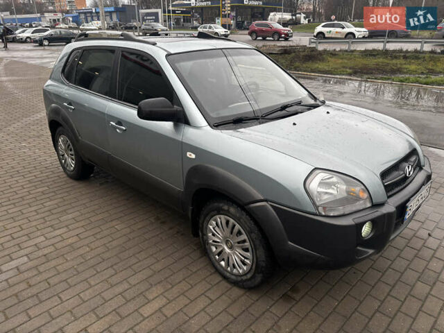 Сірий Хендай Туксон, об'ємом двигуна 2 л та пробігом 255 тис. км за 7600 $, фото 11 на Automoto.ua