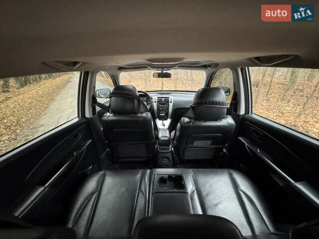 Серый Хендай Туксон, объемом двигателя 1.98 л и пробегом 269 тыс. км за 7100 $, фото 26 на Automoto.ua