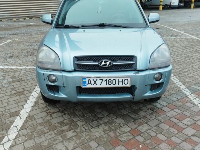 Серый Хендай Туксон, объемом двигателя 2 л и пробегом 2 тыс. км за 6800 $, фото 1 на Automoto.ua