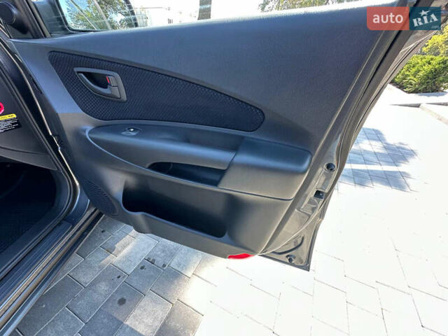 Сірий Хендай Туксон, об'ємом двигуна 1.98 л та пробігом 169 тис. км за 7300 $, фото 25 на Automoto.ua