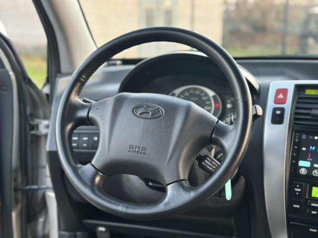 Серый Хендай Туксон, объемом двигателя 2 л и пробегом 167 тыс. км за 7299 $, фото 13 на Automoto.ua