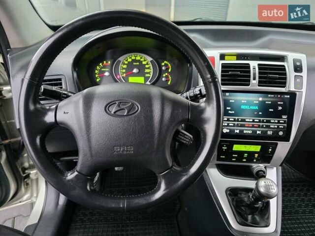Серый Хендай Туксон, объемом двигателя 2 л и пробегом 231 тыс. км за 7999 $, фото 19 на Automoto.ua