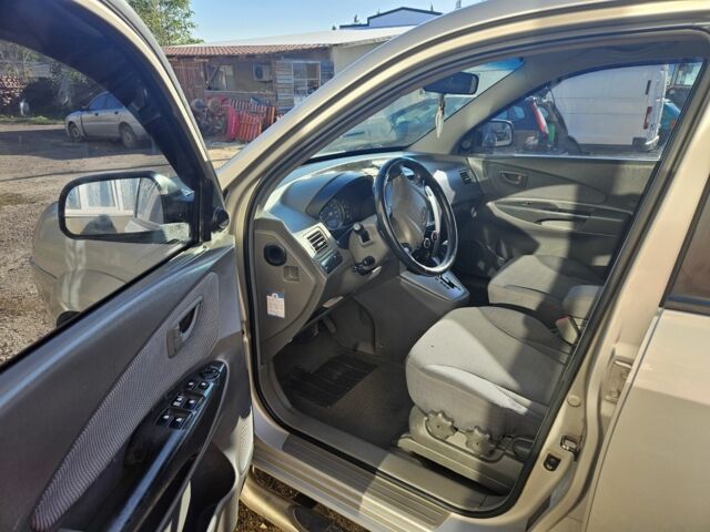 Серый Хендай Туксон, объемом двигателя 2 л и пробегом 320 тыс. км за 7150 $, фото 5 на Automoto.ua