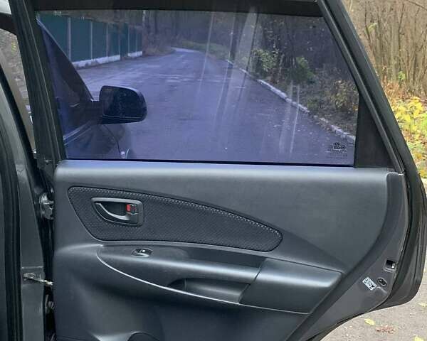 Сірий Хендай Туксон, об'ємом двигуна 1.98 л та пробігом 170 тис. км за 8800 $, фото 12 на Automoto.ua