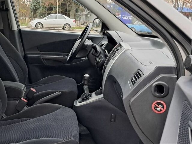 Серый Хендай Туксон, объемом двигателя 2 л и пробегом 95 тыс. км за 8800 $, фото 9 на Automoto.ua
