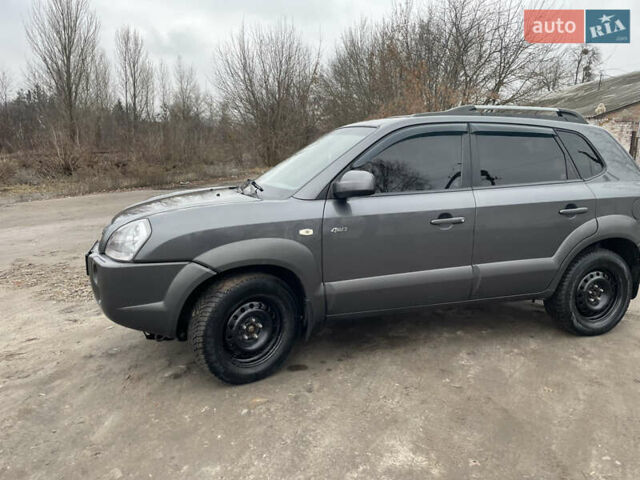 Сірий Хендай Туксон, об'ємом двигуна 1.99 л та пробігом 203 тис. км за 8550 $, фото 16 на Automoto.ua
