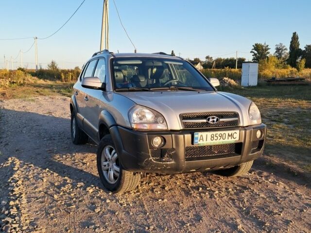 Серый Хендай Туксон, объемом двигателя 2.7 л и пробегом 244 тыс. км за 7200 $, фото 1 на Automoto.ua