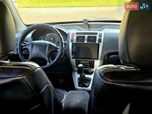 Серый Хендай Туксон, объемом двигателя 1.98 л и пробегом 199 тыс. км за 8350 $, фото 14 на Automoto.ua