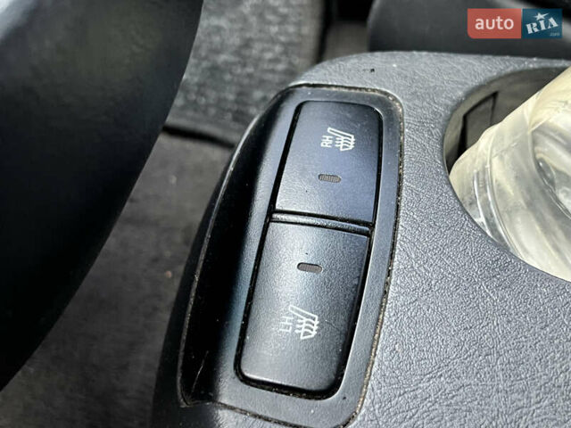Серый Хендай Туксон, объемом двигателя 2 л и пробегом 176 тыс. км за 8300 $, фото 30 на Automoto.ua