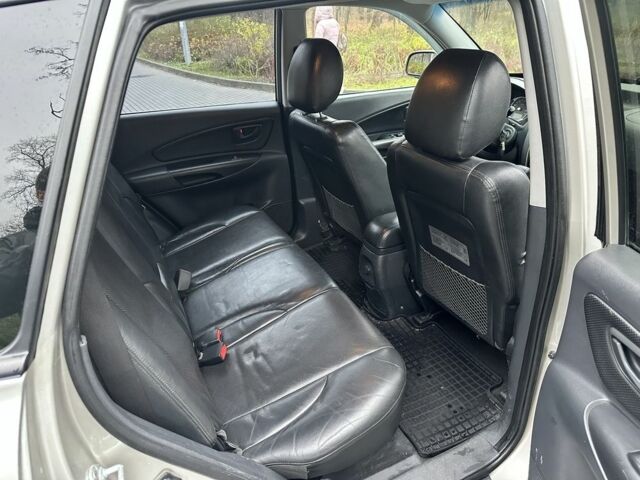 Сірий Хендай Туксон, об'ємом двигуна 2 л та пробігом 218 тис. км за 6900 $, фото 5 на Automoto.ua