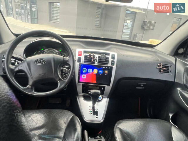 Хендай Туксон 2008 в Трускавце на Automoto.ua Серый Хендай Туксон, объемом двигателя 1.98 л и пробегом 320 тыс. км за 7399 $, фото 2 на Automoto.ua